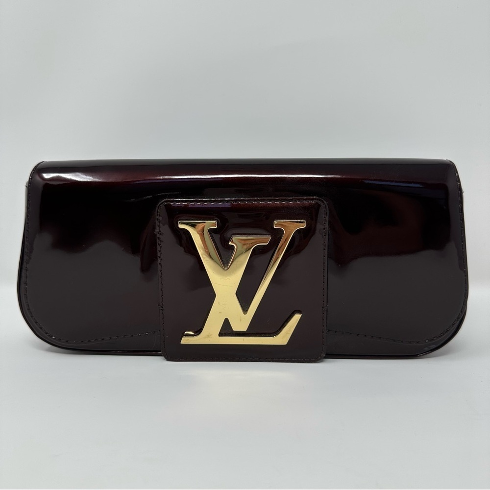 Louis Vuitton Dark Burgundy Clutch with Gold Logo